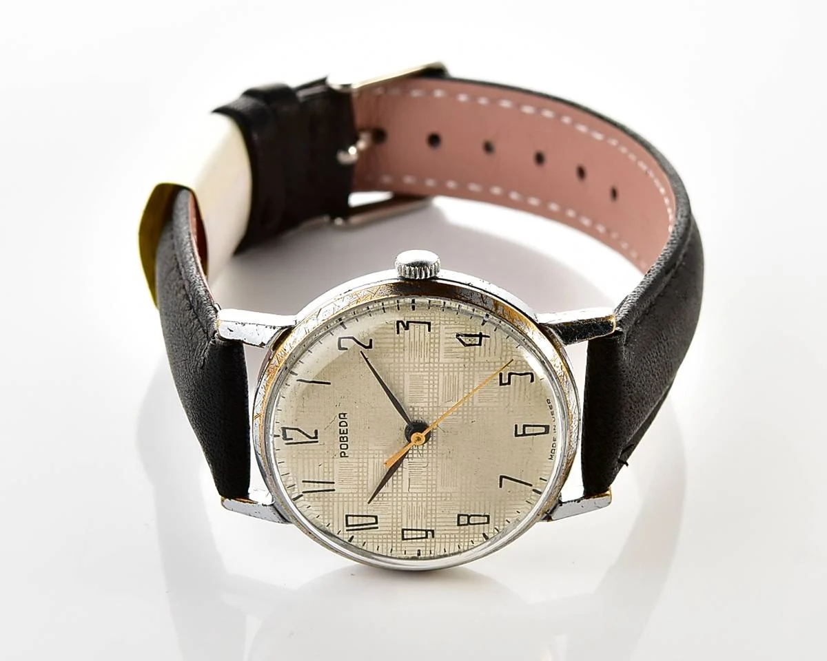 Vintage Soviet mechanical Pobeda watch with central seconds hand