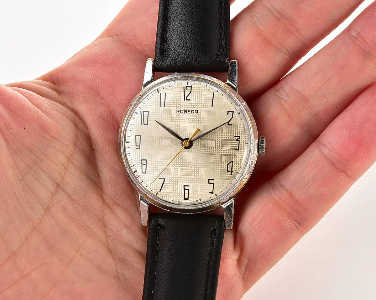 Vintage Soviet mechanical Pobeda watch with central seconds hand