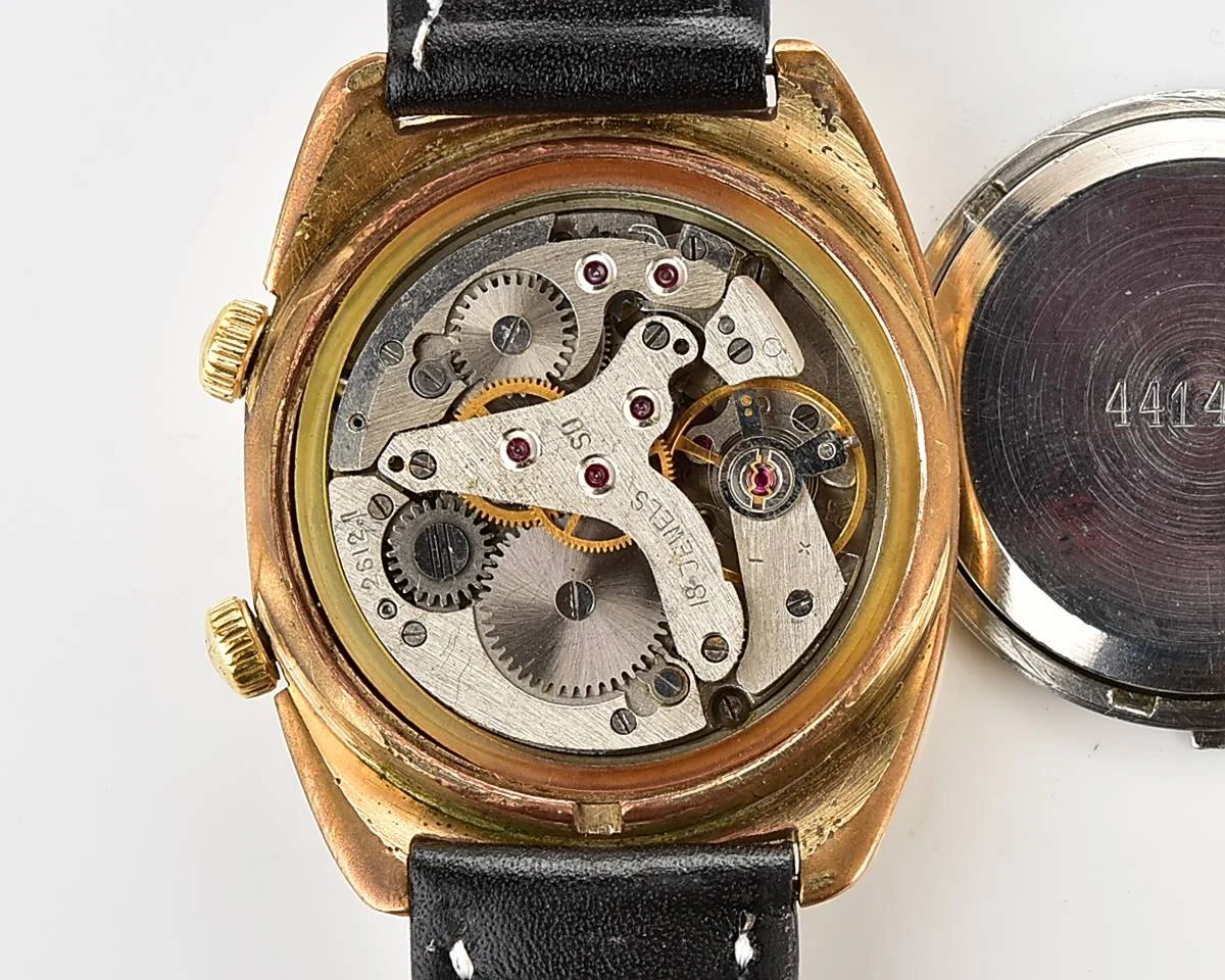 Soviet Poljot gold-plated mechanical watch with alarm clock function