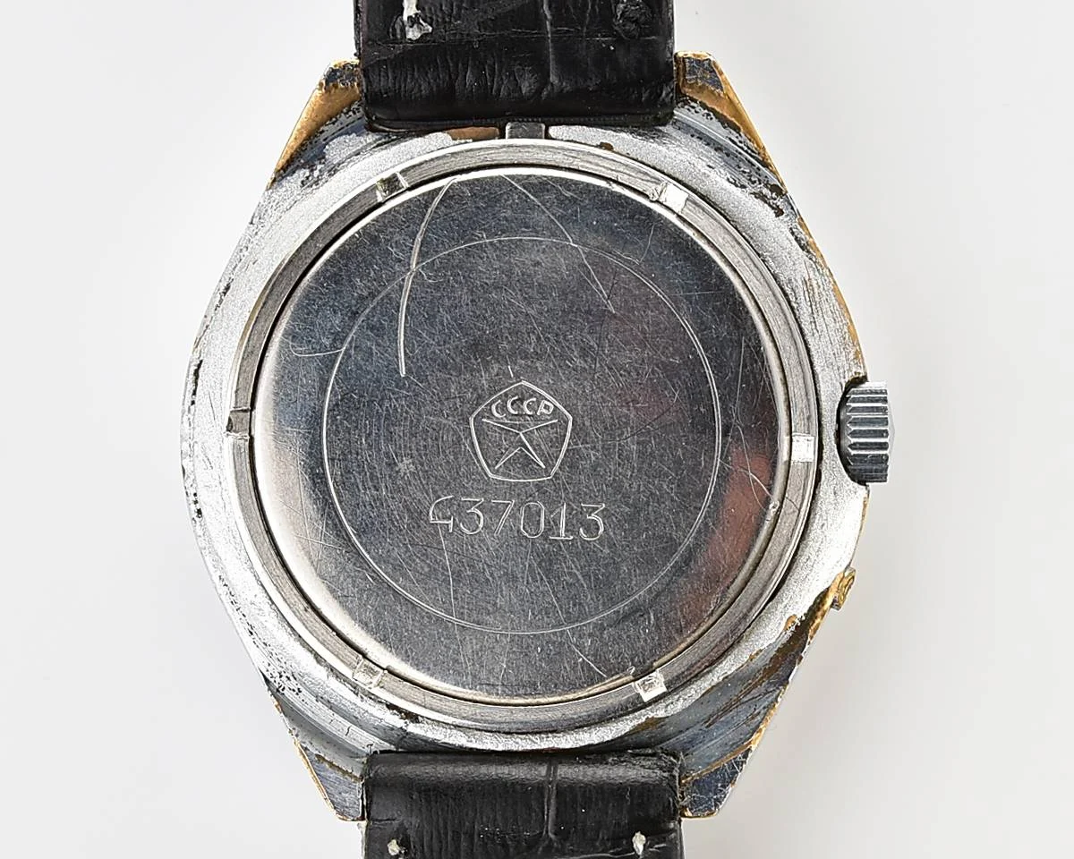 Slava Soviet mechanical vintage watch with teal dial