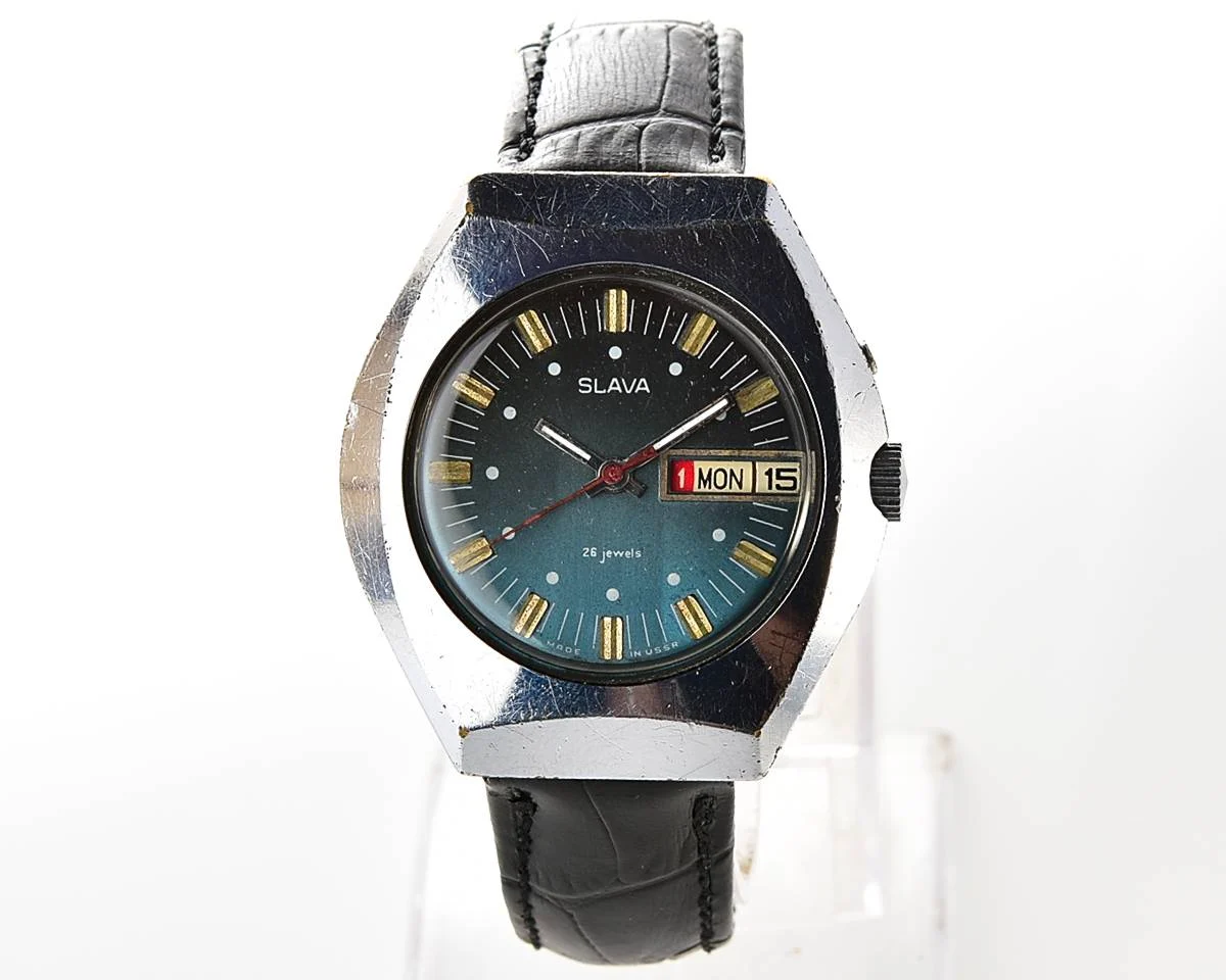 Slava Soviet mechanical vintage watch with teal dial