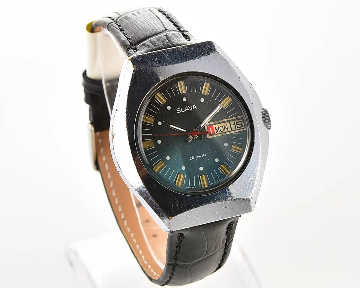 Slava Soviet mechanical vintage watch with teal dial