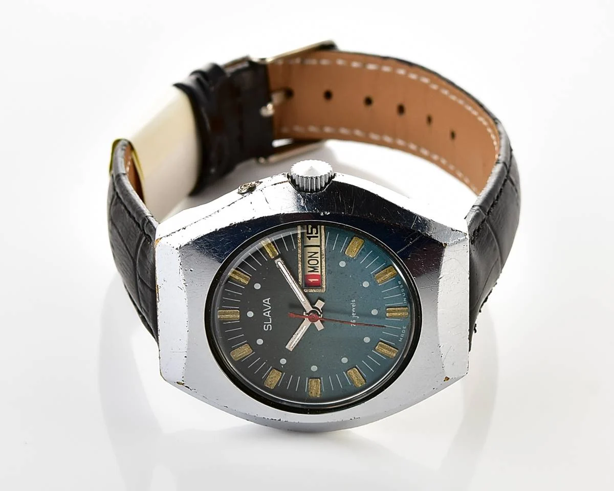 Slava Soviet mechanical vintage watch with teal dial
