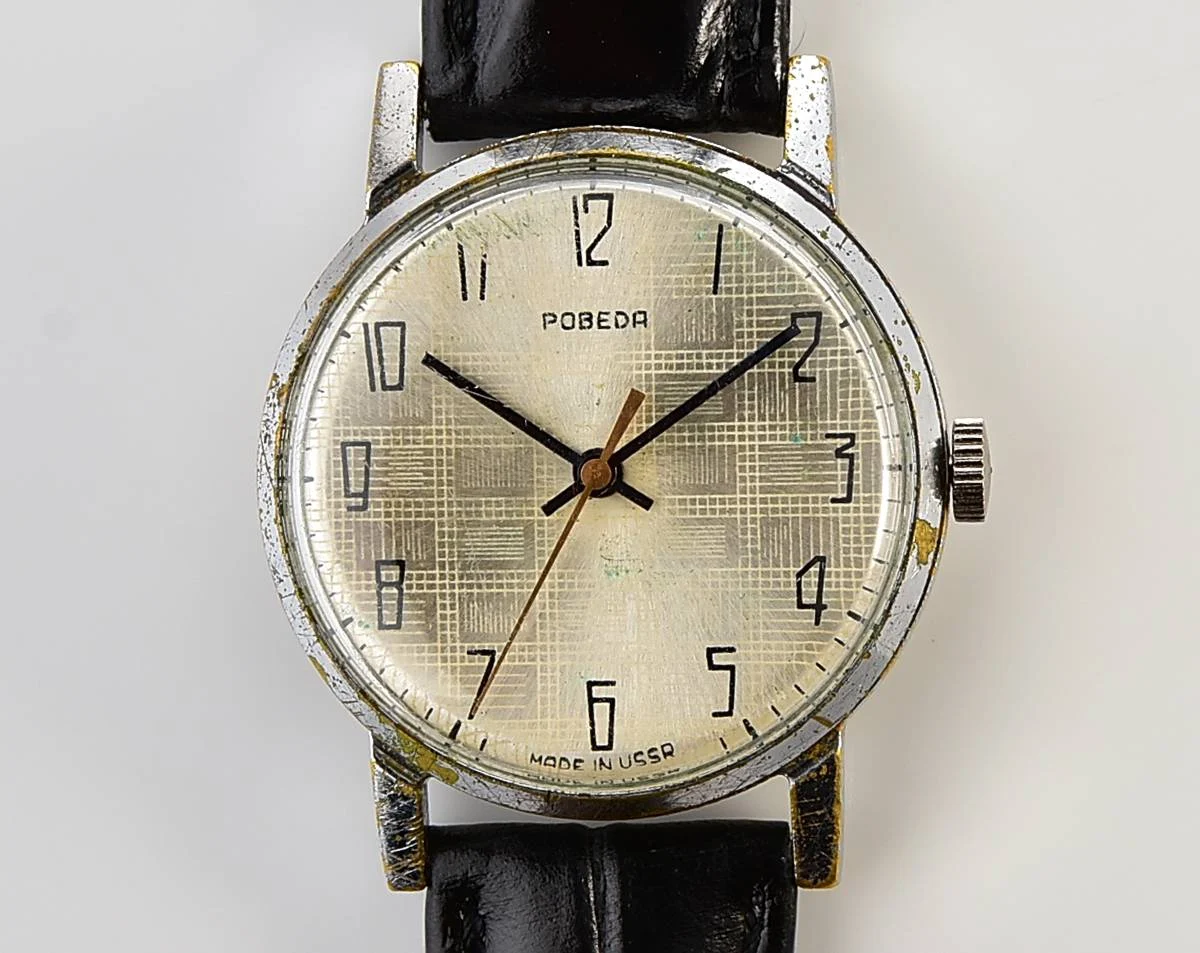 Vintage Soviet mechanical Pobeda watch with central seconds hand