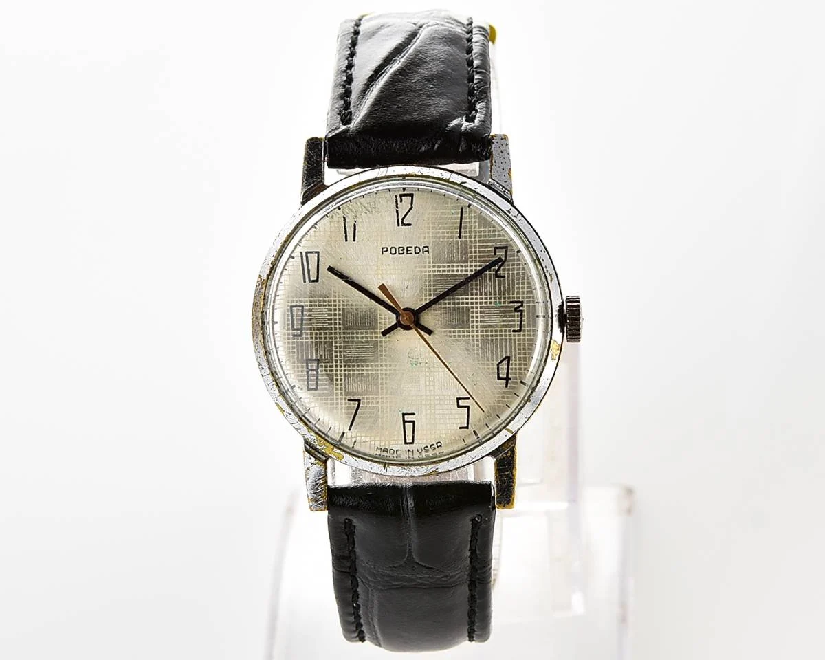 Vintage Soviet mechanical Pobeda watch with central seconds hand