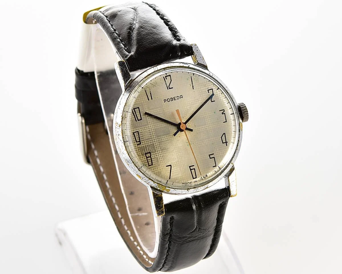 Vintage Soviet mechanical Pobeda watch with central seconds hand