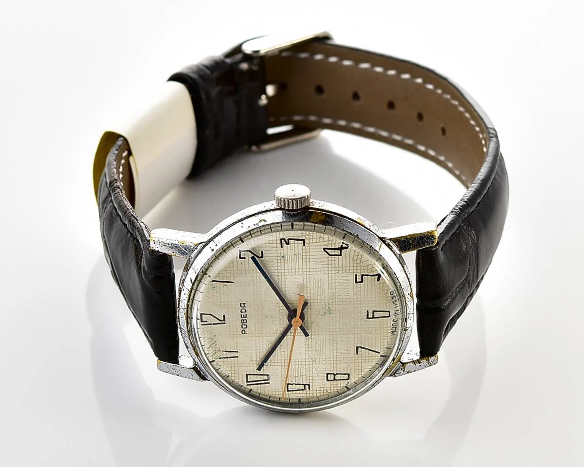 Vintage Soviet mechanical Pobeda watch with central seconds hand