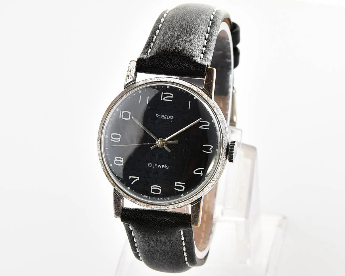 Vintage Soviet mechanical watch Pobeda, ZiM factory – black textured dial