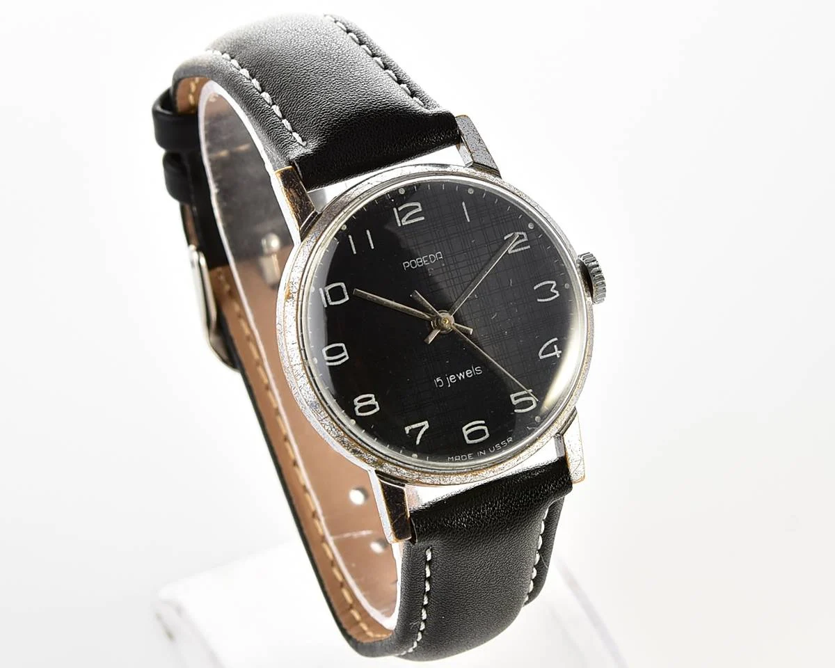 Vintage Soviet mechanical watch Pobeda, ZiM factory – black textured dial