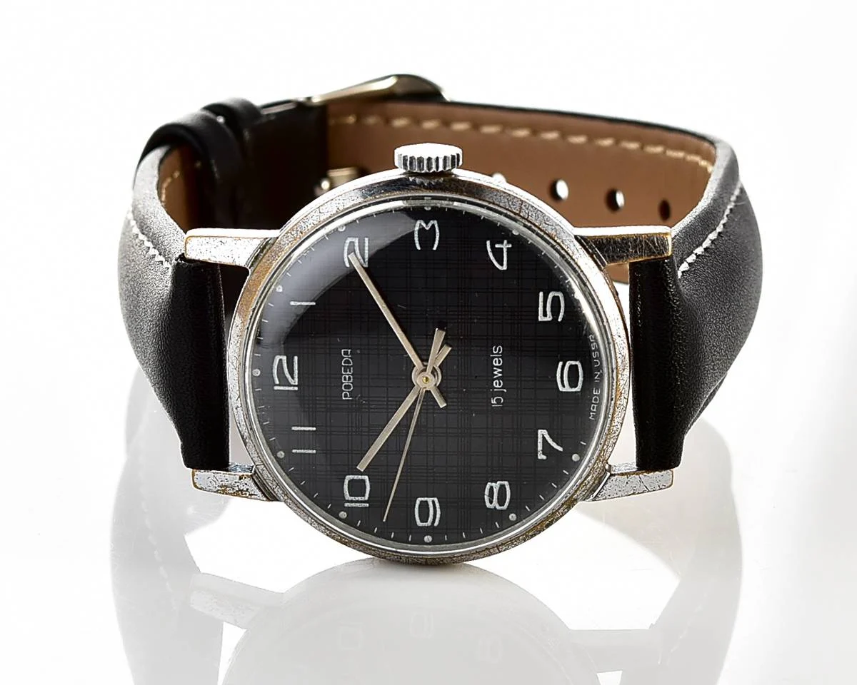 Vintage Soviet mechanical watch Pobeda, ZiM factory – black textured dial