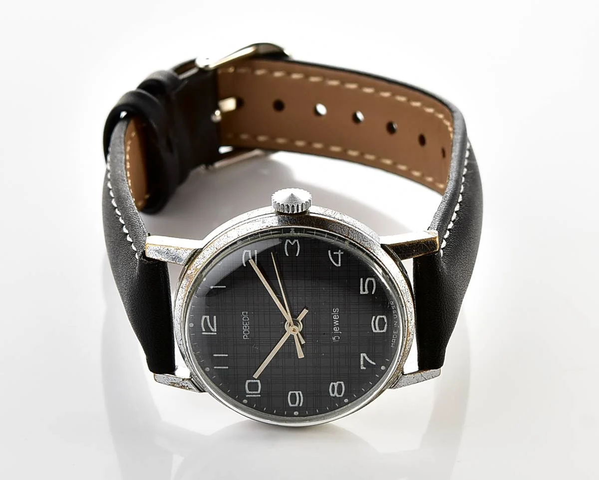 Vintage Soviet mechanical watch Pobeda, ZiM factory – black textured dial