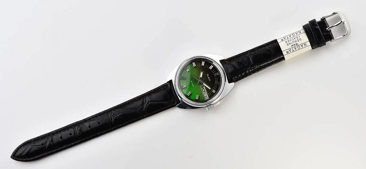 Slava Soviet mechanical vintage watch with green dial