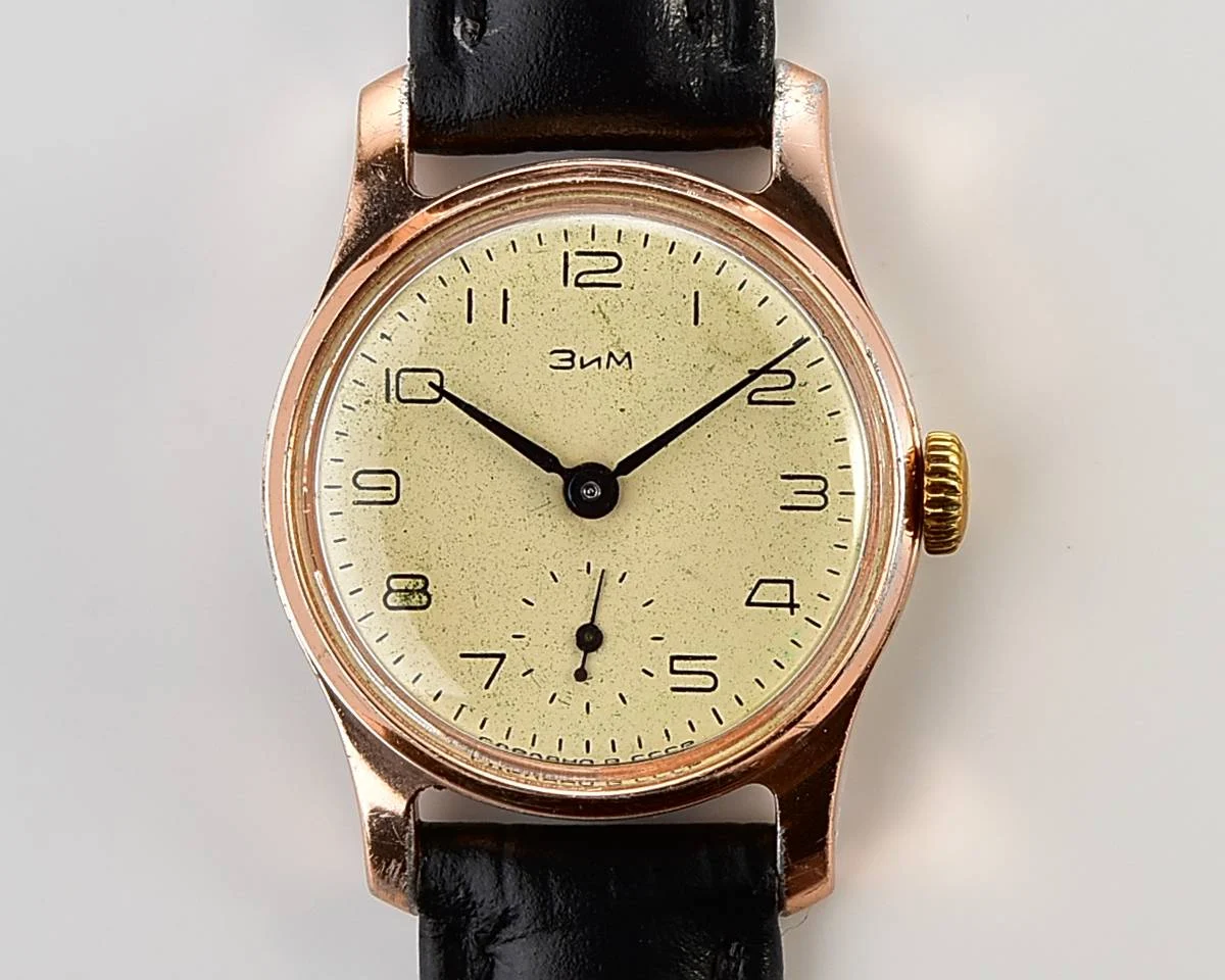 Vintage Soviet ZiM mechanical watch with engraved back