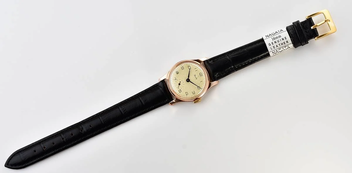 Vintage Soviet ZiM mechanical watch with engraved back