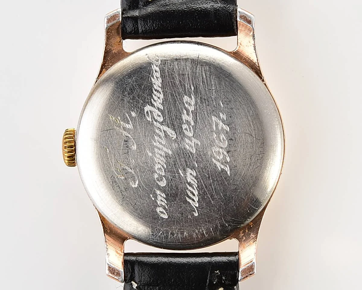 Vintage Soviet ZiM mechanical watch with engraved back