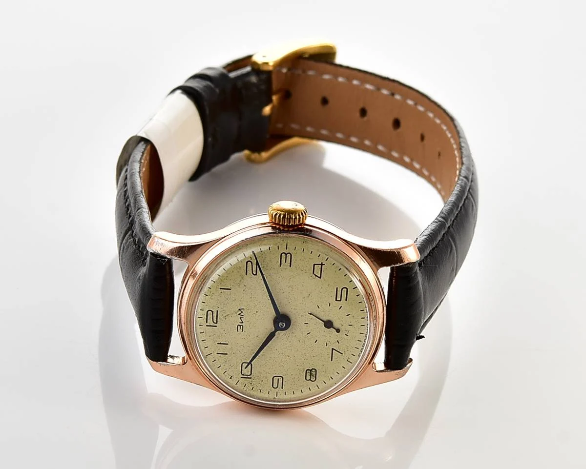 Vintage Soviet ZiM mechanical watch with engraved back