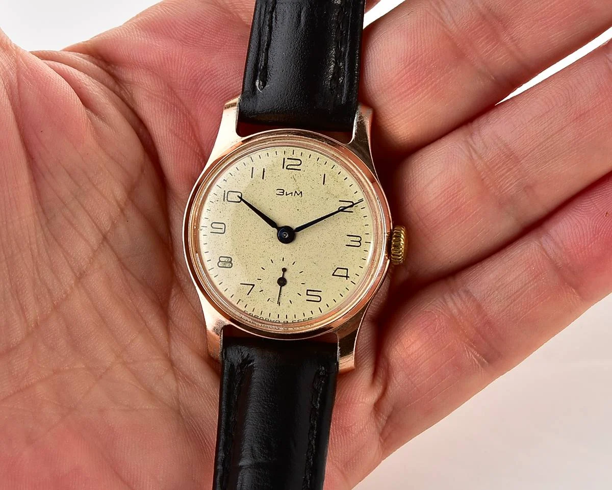 Vintage Soviet ZiM mechanical watch with engraved back