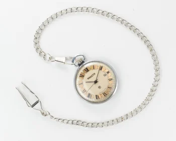 Mechanical Raketa Soviet pocket watch with calendar