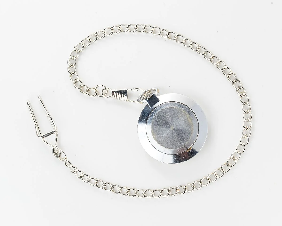 Mechanical Raketa Soviet pocket watch with calendar
