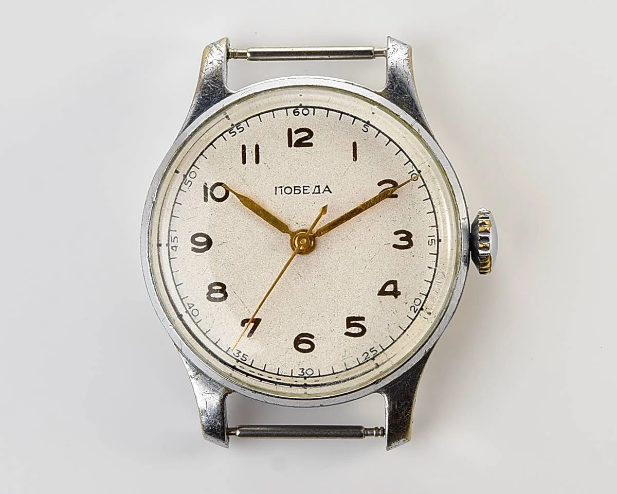 Excellent Soviet Pobeda from 1957 + exquisite Sturmanskie compass leather strap!