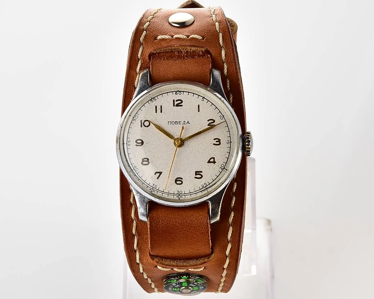 Excellent Soviet Pobeda from 1957 + exquisite Sturmanskie compass leather strap!