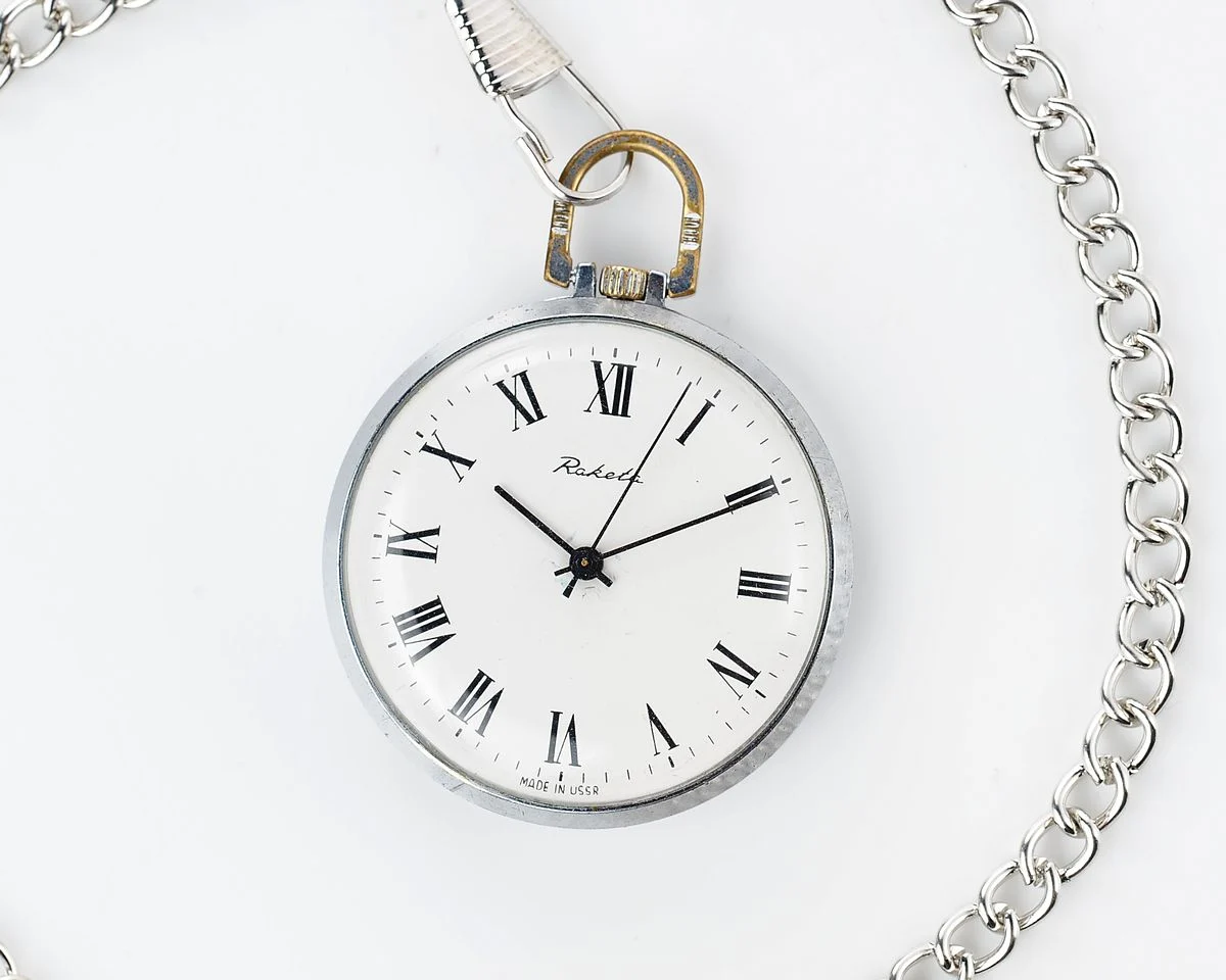 Mechanical Raketa Soviet pocket (or pendant) watch with roman numerals