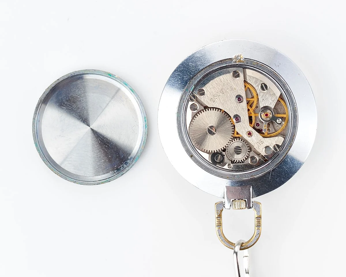 Mechanical Raketa Soviet pocket (or pendant) watch with roman numerals