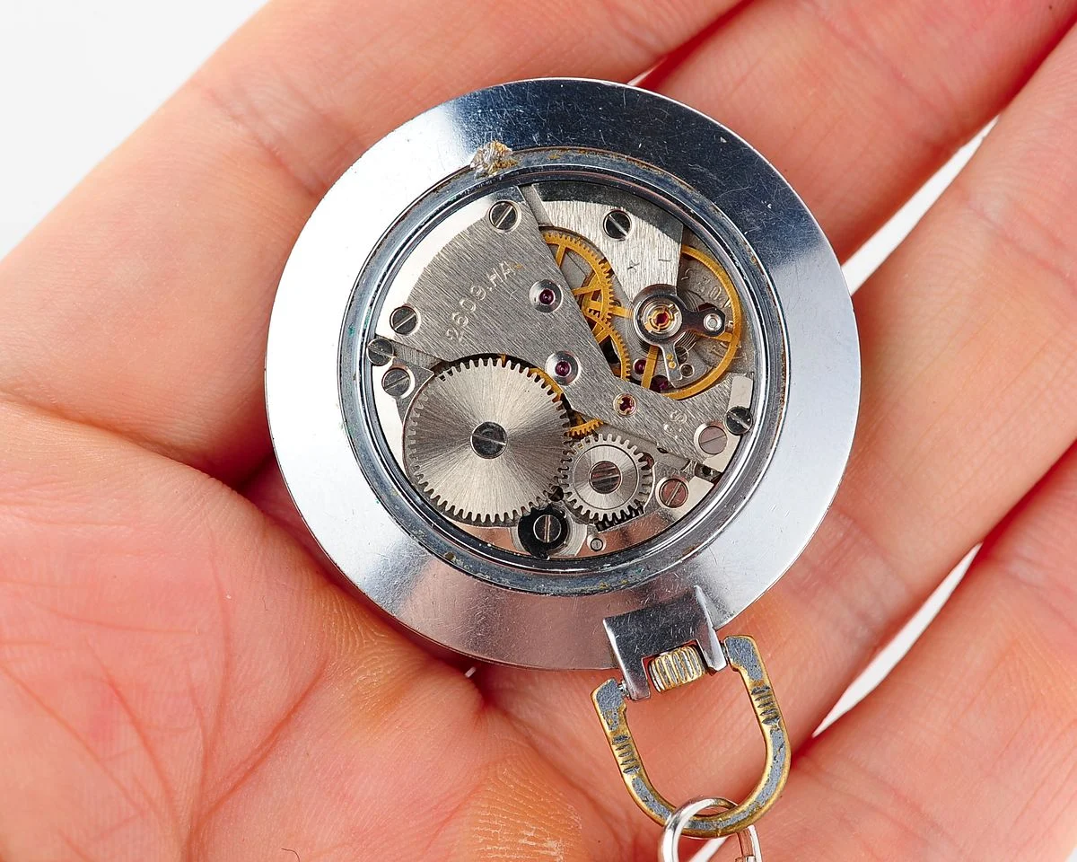 Mechanical Raketa Soviet pocket (or pendant) watch with roman numerals