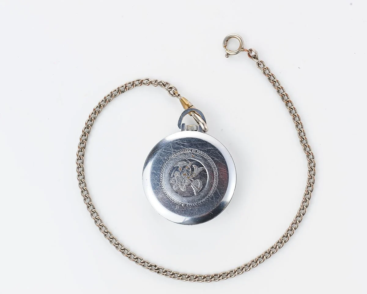 Small Soviet Vostok mechanical pocket watch (can be used as pendant)