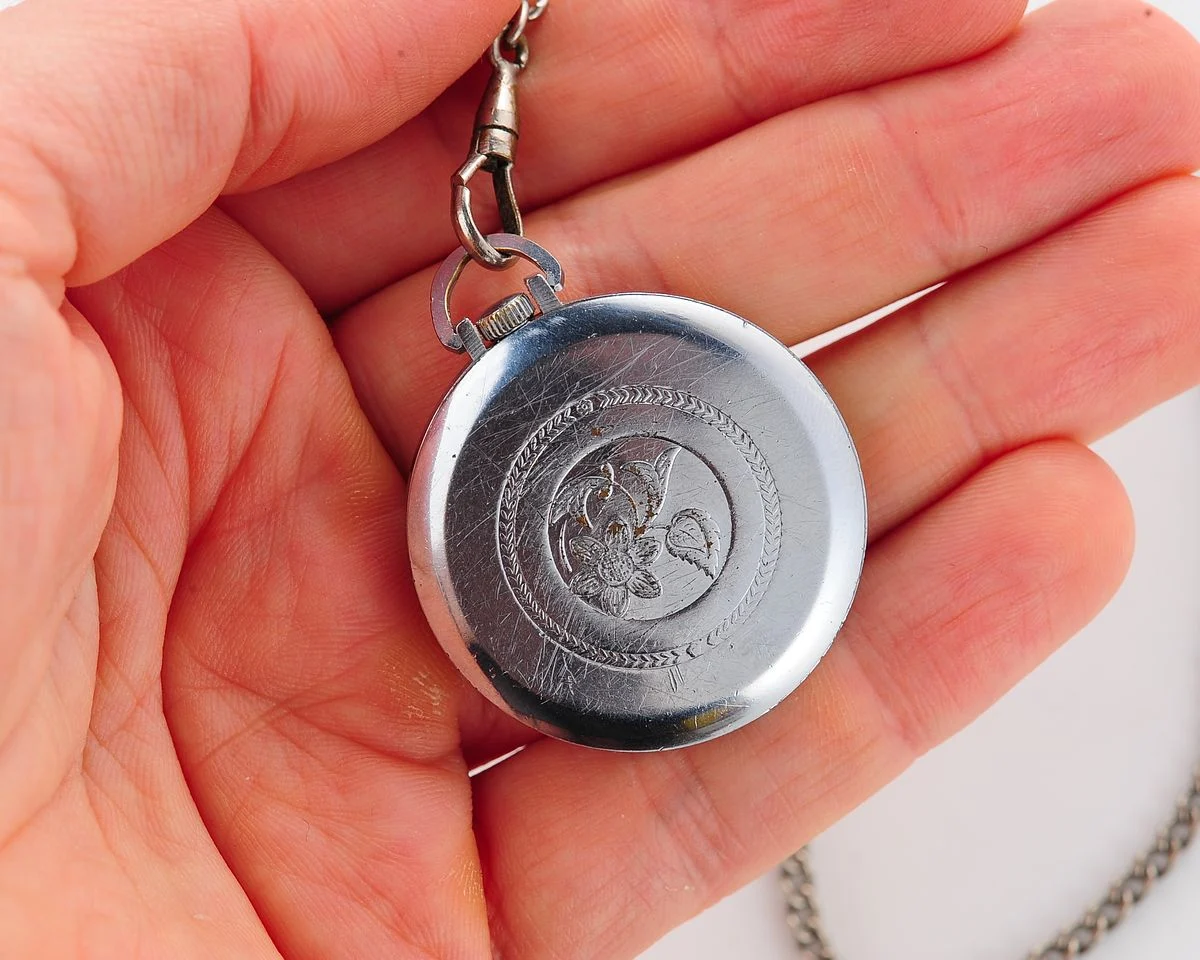 Small Soviet Vostok mechanical pocket watch (can be used as pendant)
