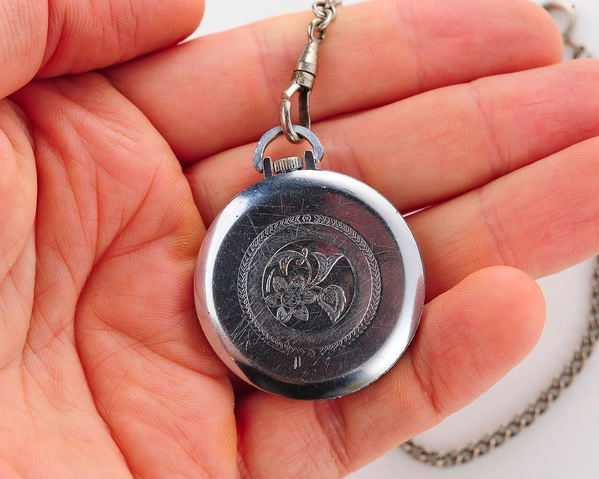 Small Soviet Vostok mechanical pocket watch (can be used as pendant)