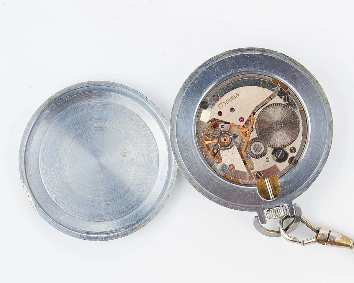 Small Soviet Vostok mechanical pocket watch (can be used as pendant)
