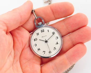 Mechanical Raketa Soviet pocket (or pendant) watch with Arabic numerals
