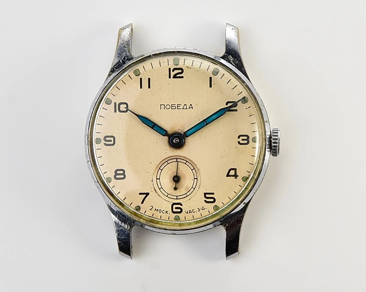 Excellent Soviet Pobeda from 1957 + exquisite Sturmanskie compass leather strap!
