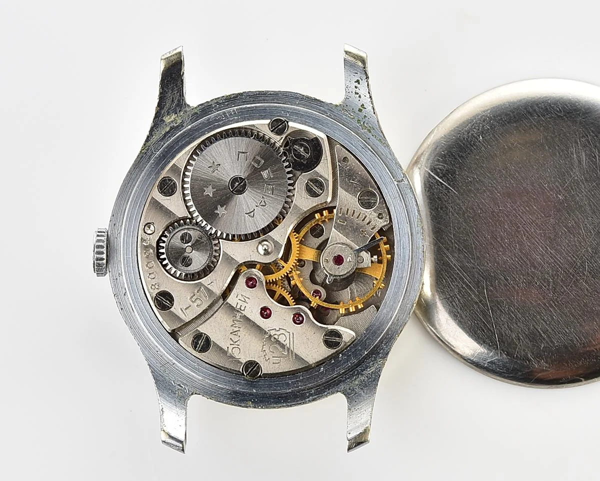 Excellent Soviet Pobeda from 1957 + exquisite Sturmanskie compass leather strap!