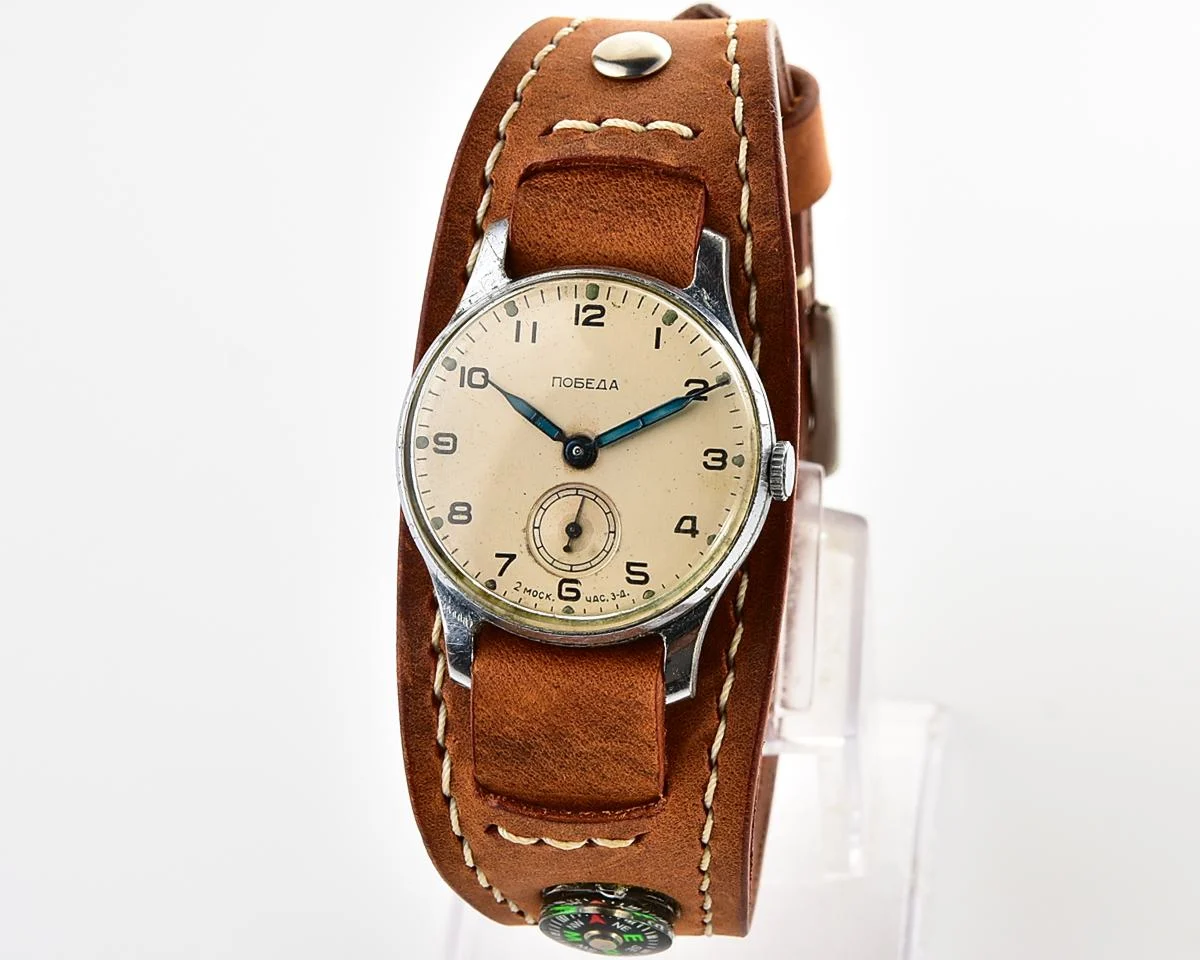 Excellent Soviet Pobeda from 1957 + exquisite Sturmanskie compass leather strap!
