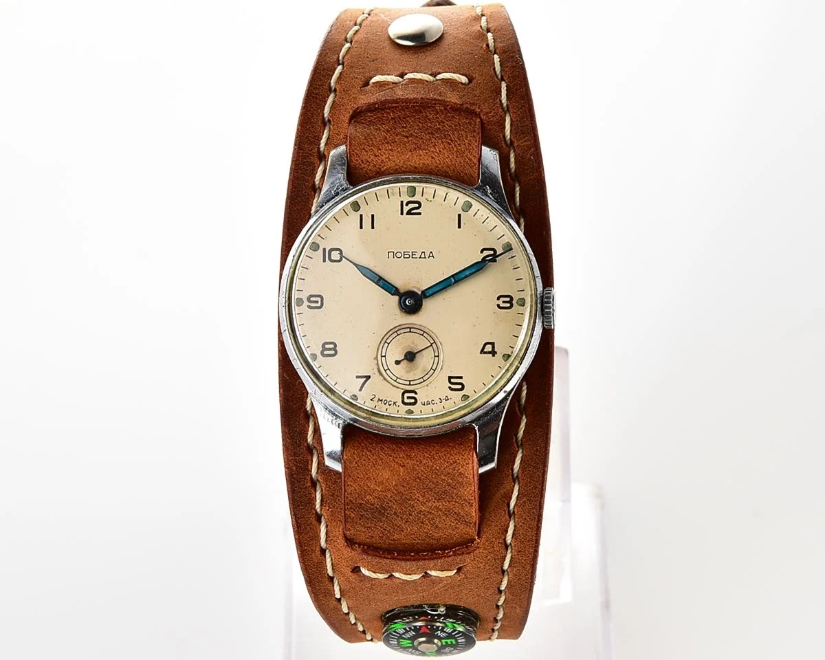 Excellent Soviet Pobeda from 1957 + exquisite Sturmanskie compass leather strap!