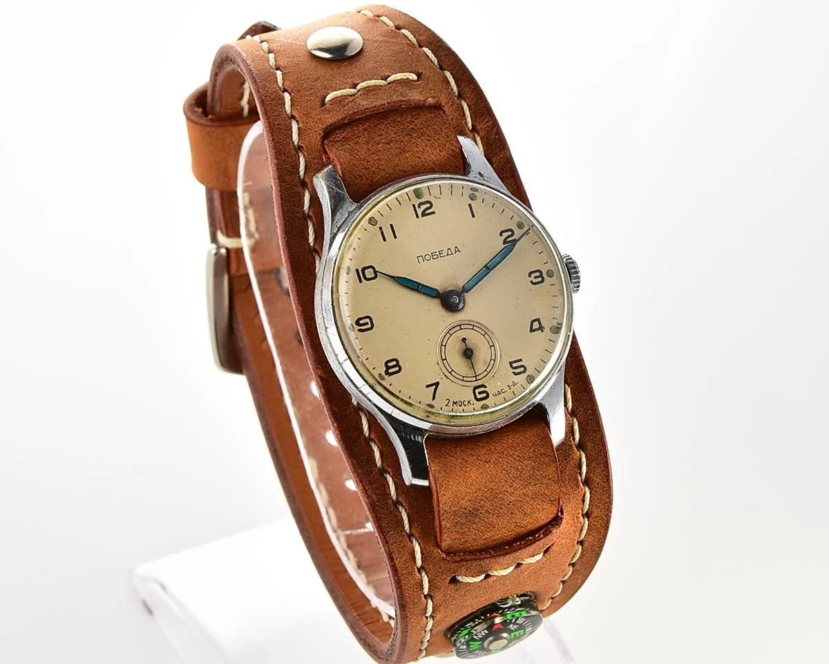 Excellent Soviet Pobeda from 1957 + exquisite Sturmanskie compass leather strap!