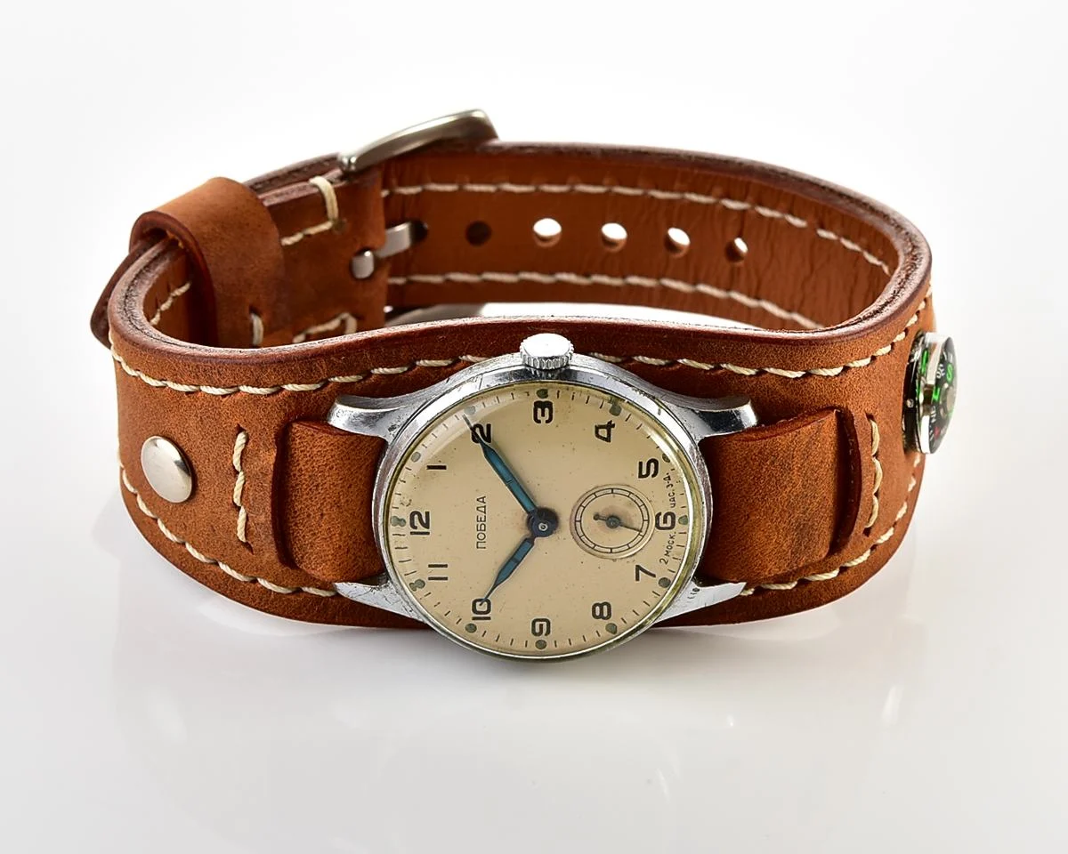 Excellent Soviet Pobeda from 1957 + exquisite Sturmanskie compass leather strap!