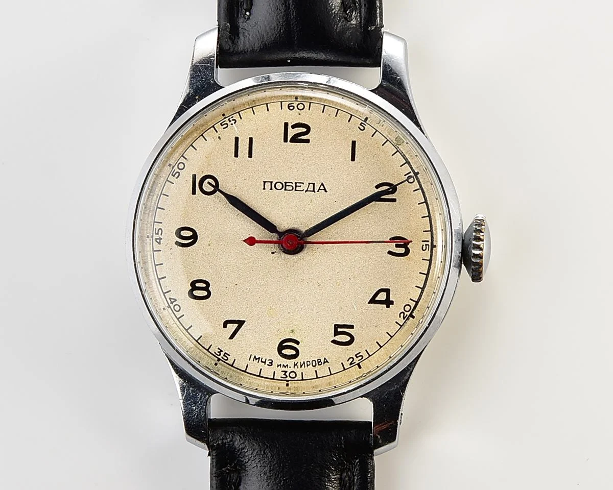 Excellent vintage Pobeda watch with central seconds hand and diamond shaped crown!