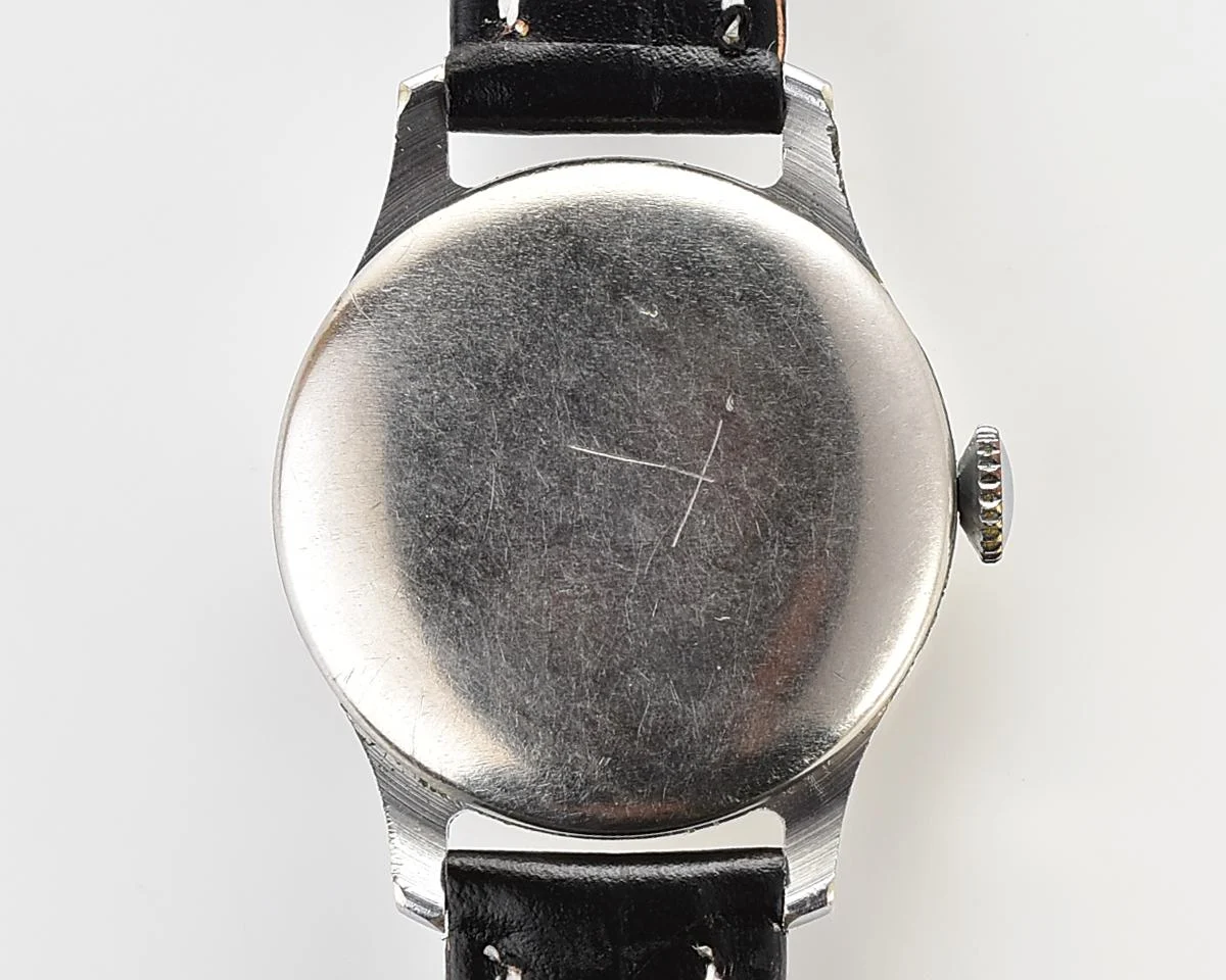 Excellent vintage Pobeda watch with central seconds hand and diamond shaped crown!