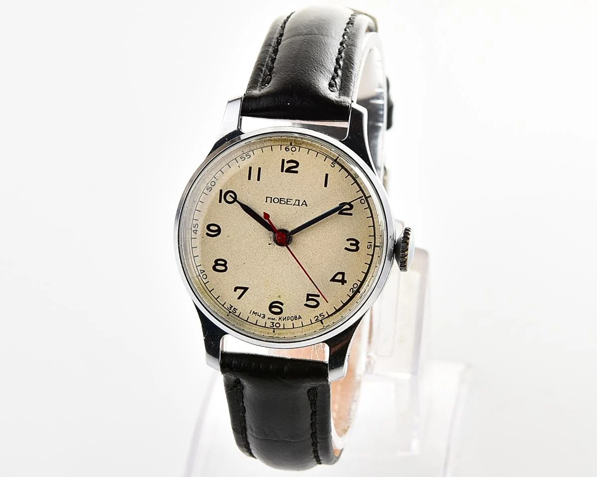Excellent vintage Pobeda watch with central seconds hand and diamond shaped crown!