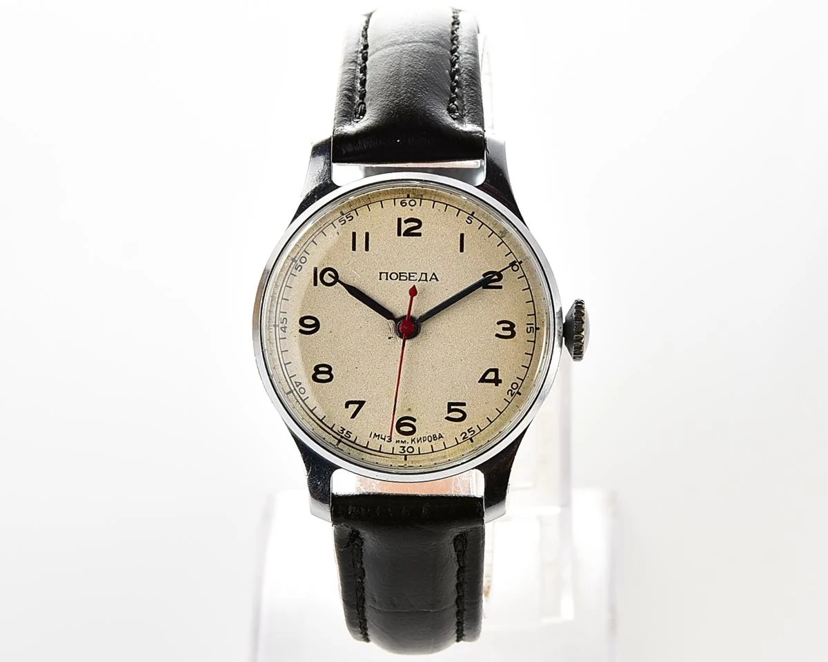 Excellent vintage Pobeda watch with central seconds hand and diamond shaped crown!