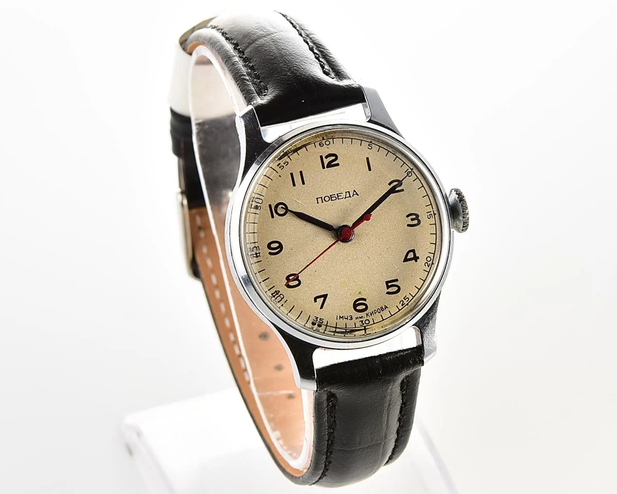 Excellent vintage Pobeda watch with central seconds hand and diamond shaped crown!