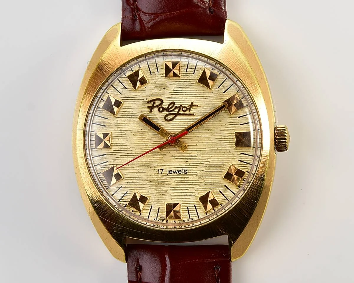 Soviet Poljot mechanical gold-plated wrist watch with intricate textured dial