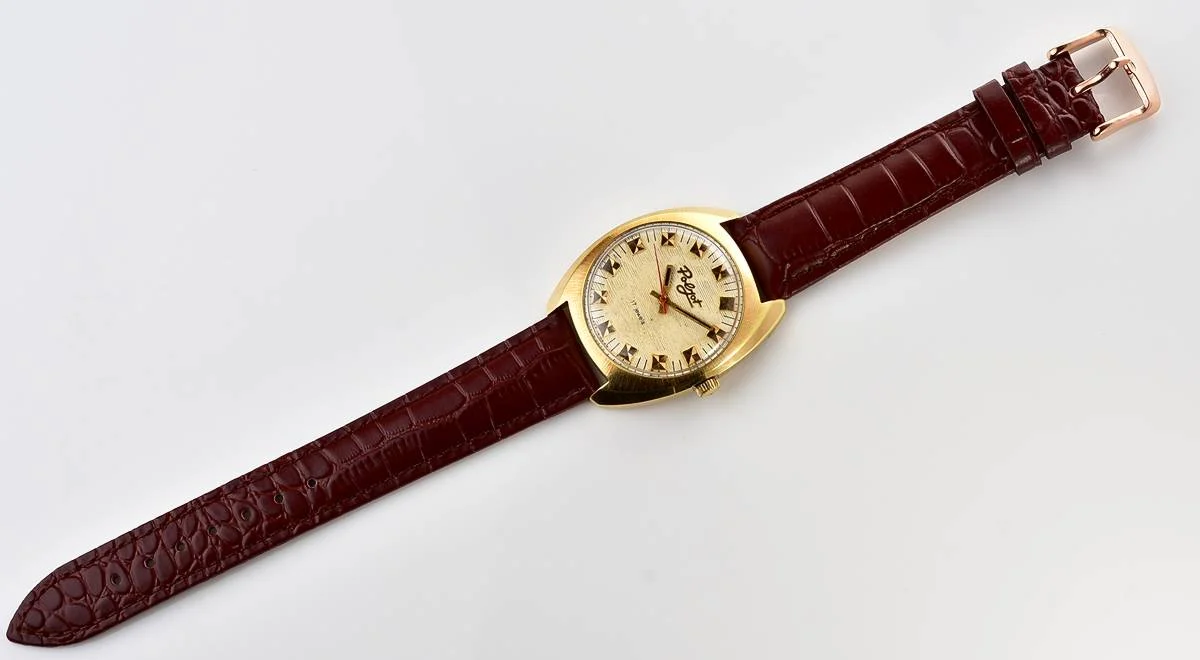 Soviet Poljot mechanical gold-plated wrist watch with intricate textured dial