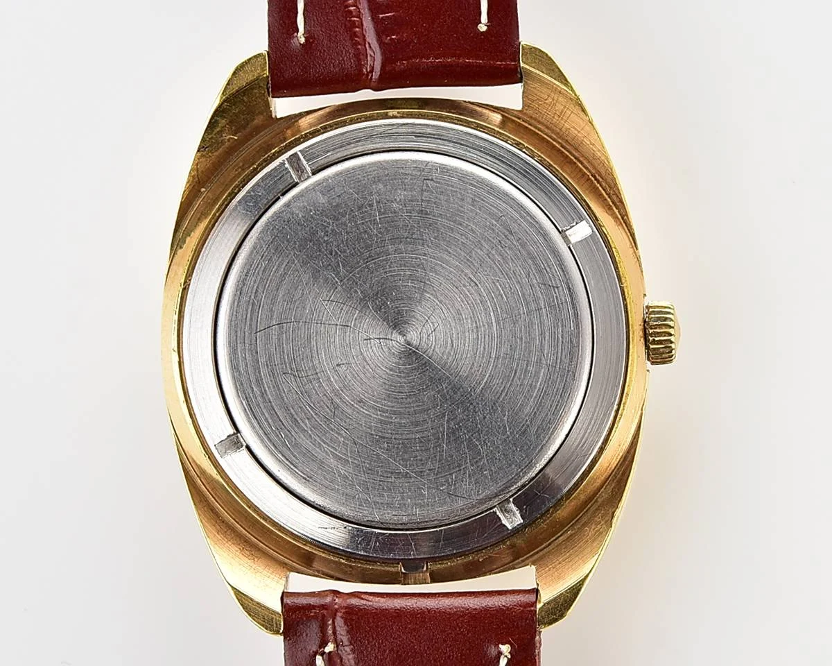 Soviet Poljot mechanical gold-plated wrist watch with intricate textured dial