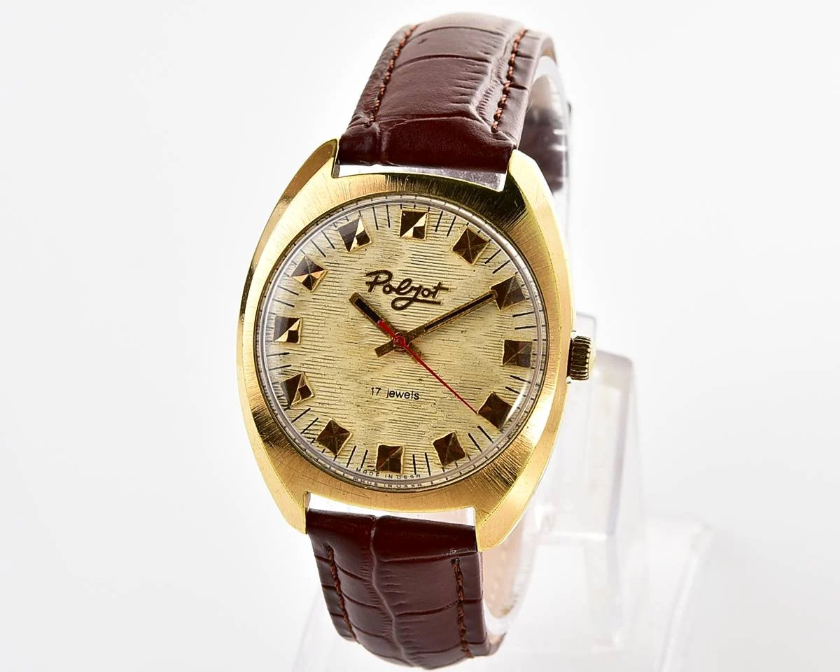 Soviet Poljot mechanical gold-plated wrist watch with intricate textured dial