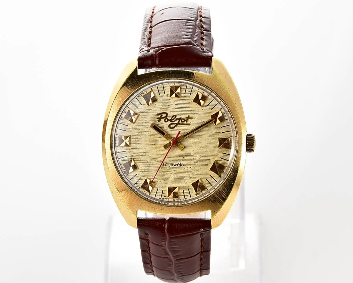 Soviet Poljot mechanical gold-plated wrist watch with intricate textured dial
