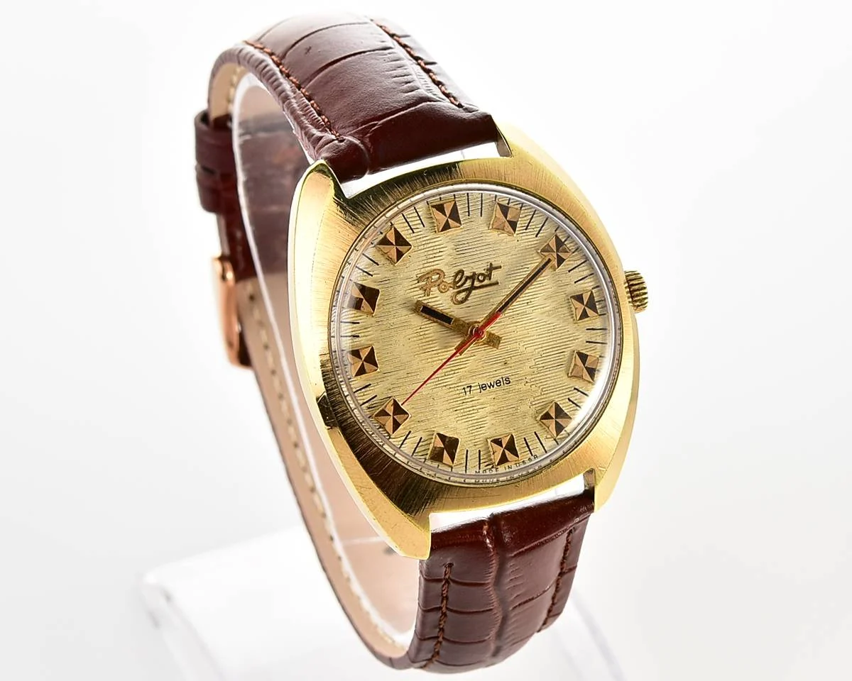 Soviet Poljot mechanical gold-plated wrist watch with intricate textured dial